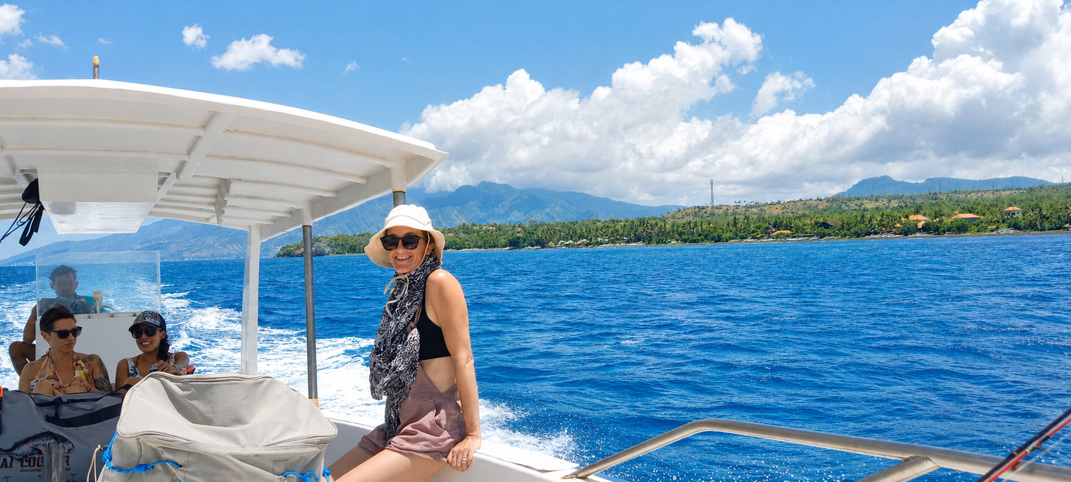 Three women on a speedboat during a dive trip in Bali