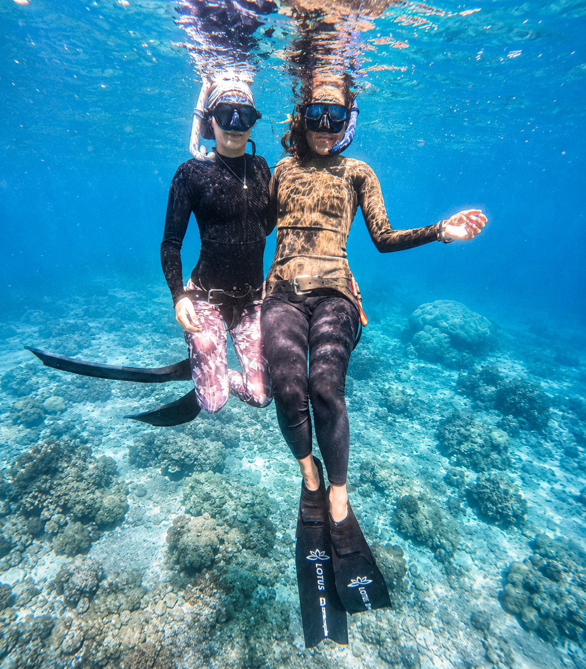 Zoe and @anapa.natalia posing during their recreational boat dive at Golden Rock